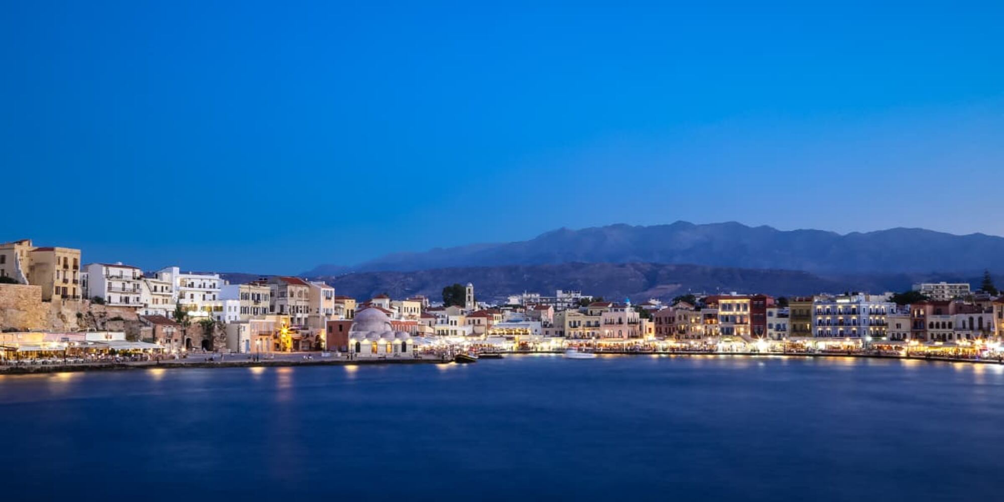 The old Venetian harbor of Chania, Crete at golden hour